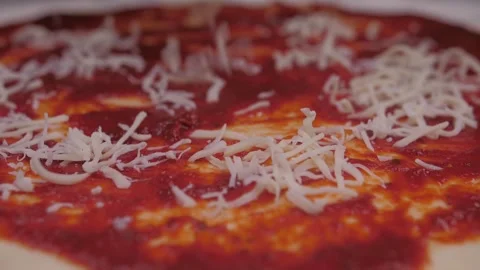 Putting mozzarella cheese in pizza Stock-Footage 150458140