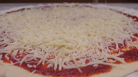 Putting mozzarella cheese in pizza slow motion 4k Stock Footage 150604192