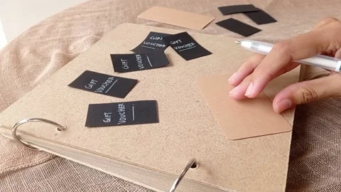 Putting office tools on a brown table Stock Footage 146257838