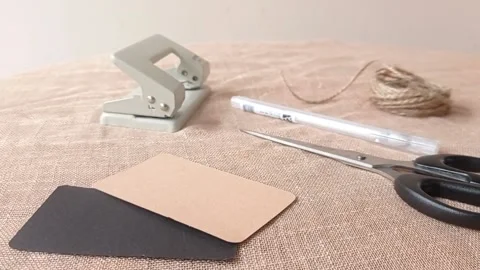 Putting office tools on a brown table Stock Footage 146259500