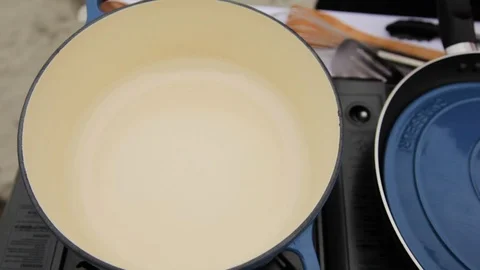 Putting oil in the pot Stock Footage 88812589