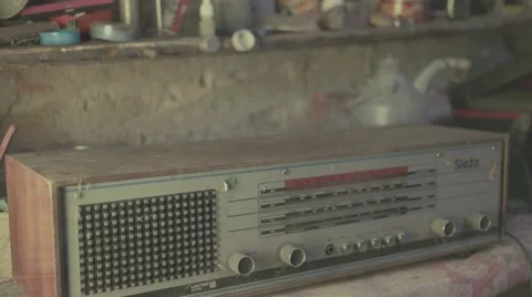 Putting old radio on workbench - Flat image Stock Footage 67452026