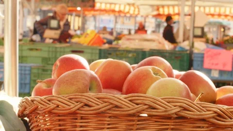 Putting One Apple into Apple Basket Stock Footage 113283485