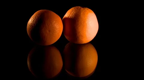 Putting orange on a table Stock Footage 8841448