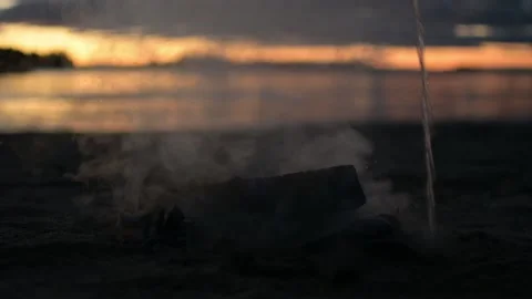 Putting out fire on a beach Stock Footage 236198967