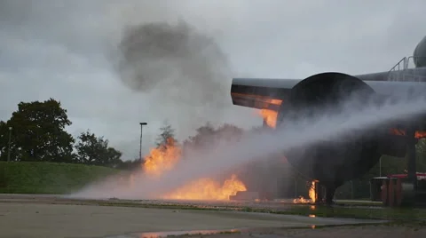 Putting out the fire on burning airplane Stock Footage 43251764