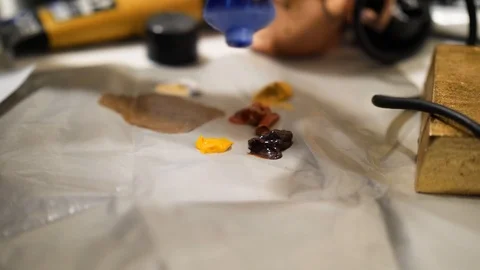 Putting Paint on Easel Stock Footage 91337675