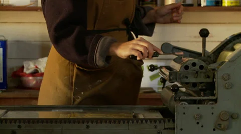 Putting Paint on a Letter Press Machine 스톡 동영상 33055546
