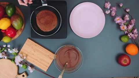Putting the pancake on a plate Stock Footage 249429036