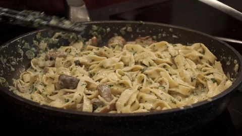 Putting pasta in the plate Stock Footage 113527315