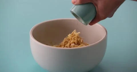 Putting pepper on shredded potatoes 2 Stock Footage 132149768