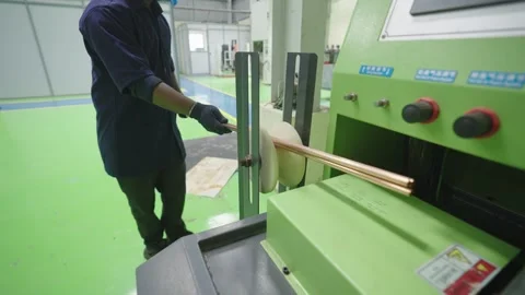 Putting Pipe Brass Copper Rod in Machine Stock Footage 322114907
