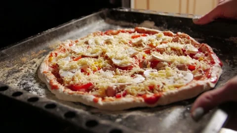 Putting Pizza In The Oven Stock Footage 130431474