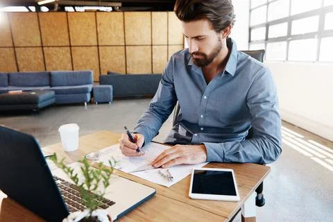 Putting the plans to paper Stock Photos