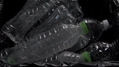 Putting Plastic Bottle In garbage Video stock 103190162