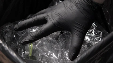 Putting Plastic Bottle In Garbage Video stock 103985456