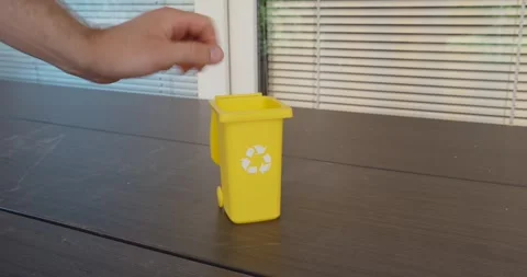 Putting Plastic Waste into Recycling Container Stock Footage 345411634