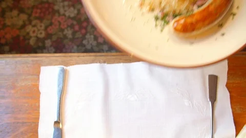 Putting Plate of German Meal  on Table Vídeos de archivo 113283865