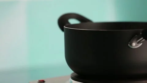 Putting potatoes in boiling water Stock Footage 132149123