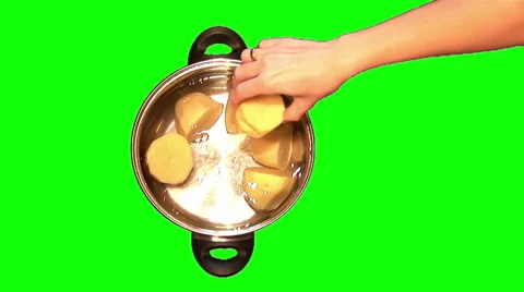 Putting potatoes in a saucepan Stock Footage 44888632