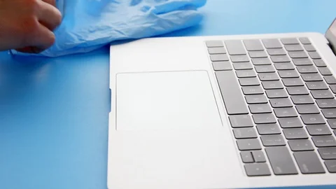 Putting on protective gloves at work Stock Footage 127653492