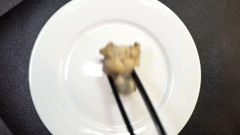 Putting puff khinkal on plate Stock Footage 101967419