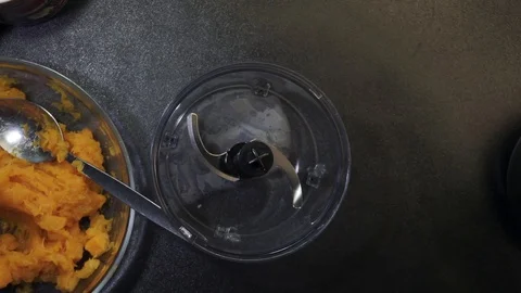 Putting pumpkin into blender Stock Footage 97410510