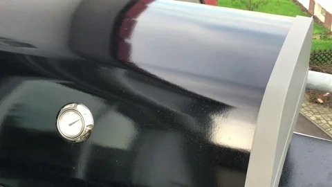 Putting a raw delicious steak on BBQ Stock Footage 76098089