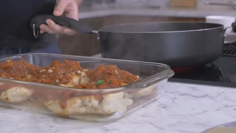 Putting Red Sauce onto Chicken Video stock 97741707
