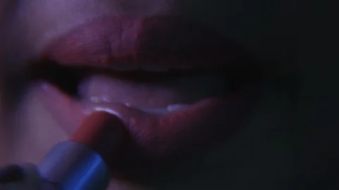 Putting on red/pink/purple lipstick Stock Footage 87705707
