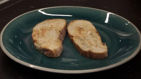 Putting ricotta and figs on bread Stock Footage 113527535