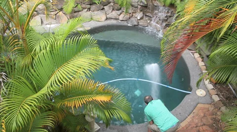 Putting Salt In Pool Stock Footage 34407118