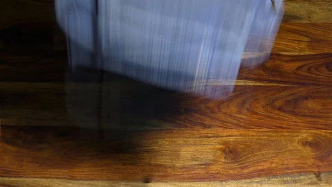 Putting shirts on the table and stacking them on each other Stock Footage 128198644