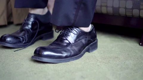 Putting shoes on Stock Footage 54998797