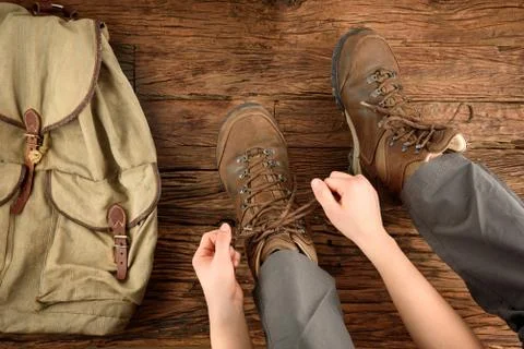 Putting on shoes Stock Photos