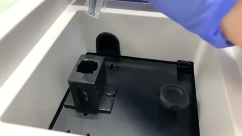Putting Simple in the Spectrophotometer, Lab Concept, Science Idea Stock Footage 135852036