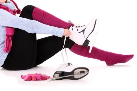 Putting on skates Stock Photos