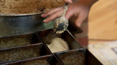 Putting Some Dough In The Bread Pans Stock Footage 64344479