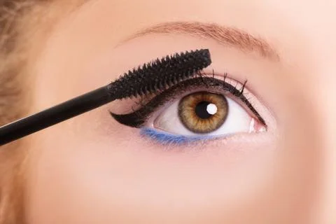 Putting some mascara on Stock Photos