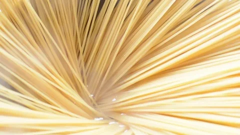 Putting spaghetti into the boiling water Stock Footage 74290844