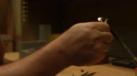 Putting Stone in Wax Stock Footage 51868063