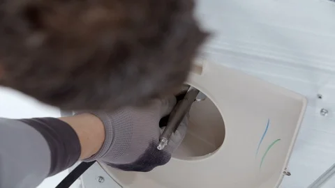 Putting a strap around something Stock Footage 85835807