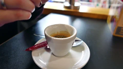 Putting Sugar in Espresso Cofee Stock Footage 58466117