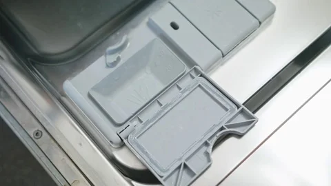 Putting Tablet in Dishwasher Machine Stock Footage 82638502