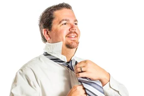Putting on a tie 2 Stock Photos