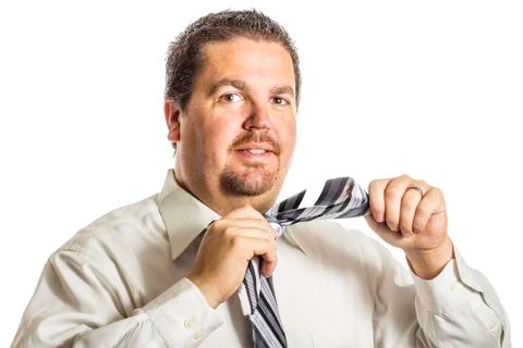 Putting on a tie 3 Stock Photos