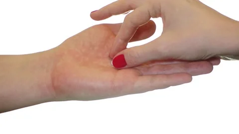 Putting a tiny pill on a big palm Stock Footage 144638350