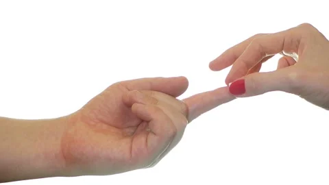 Putting a tiny pill on a finger Stock Footage 144638347