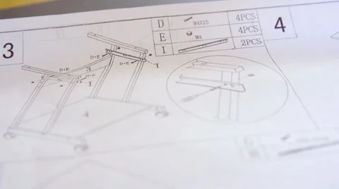 Putting together small office desk with wheels 4K Stock Footage 54059782