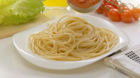 Putting tomato sauce on spaghetti Stock Footage 67991403